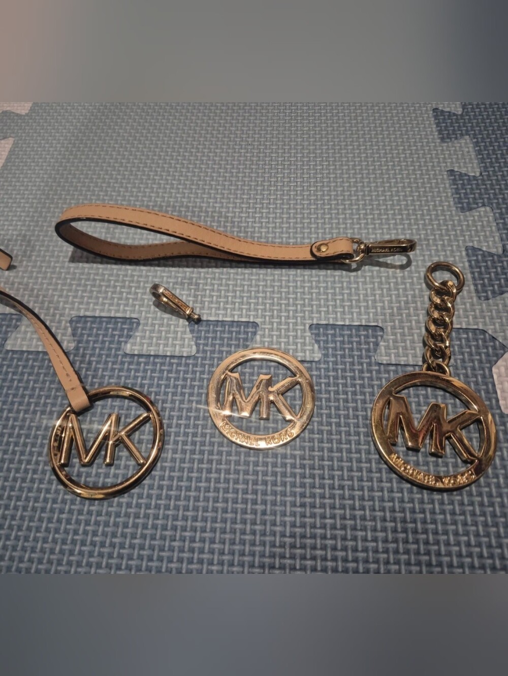 Michael Kors Gold Logo Charm Lot & Beige Leather Wristlet Strap